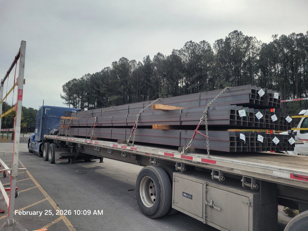 Structural steel beams loaded for a Midwest to Houston run