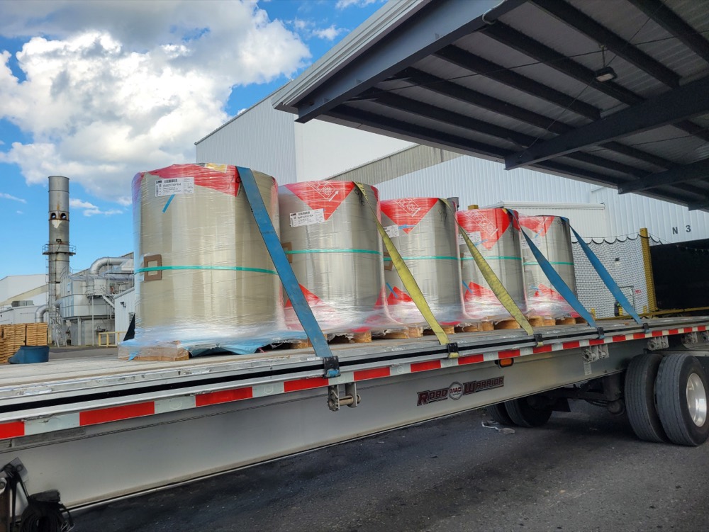 Five steel coils loaded and ready for delivery