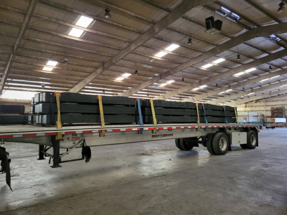 Railroad ties loaded for a Midwest run